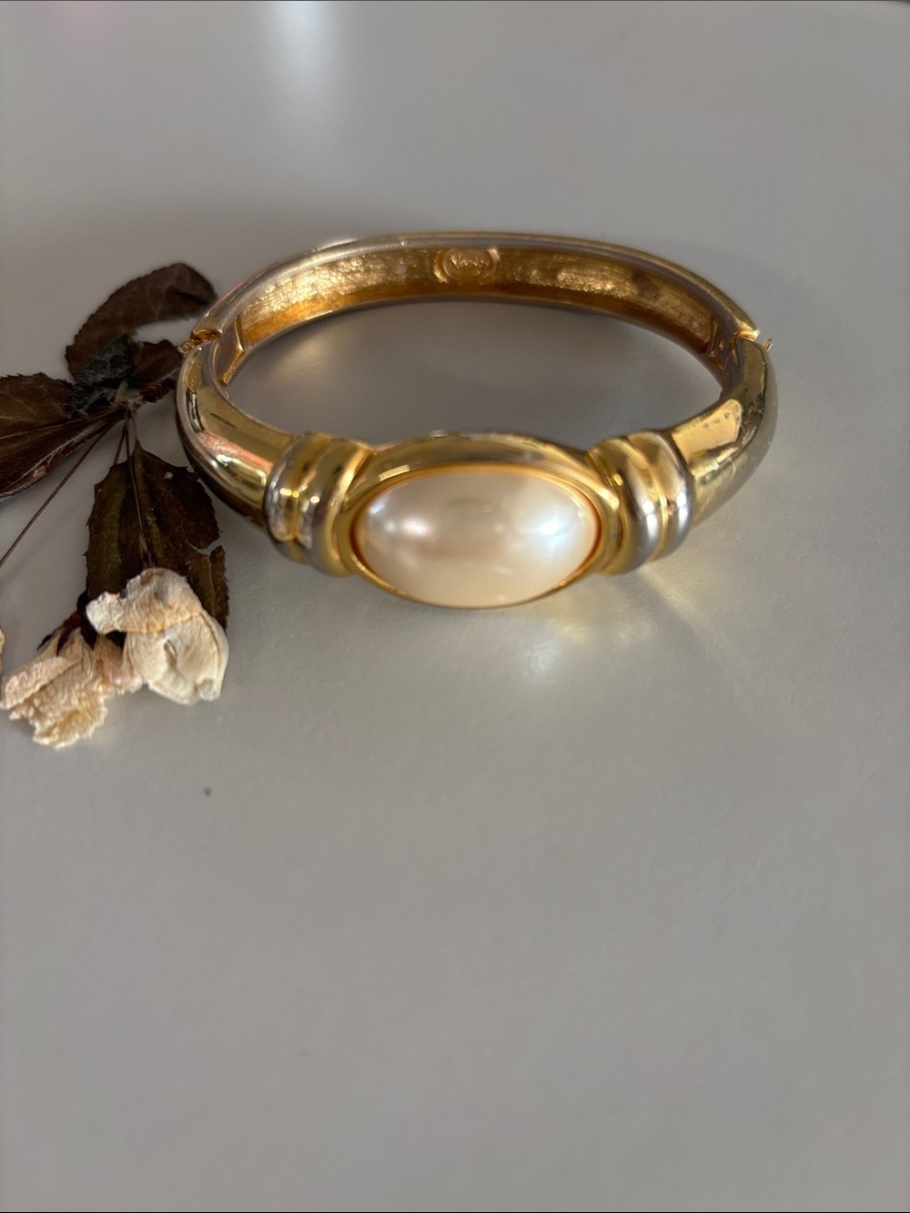 Signed Napier Gold-Tone Pearl Center Hinged Bangle Bracelet